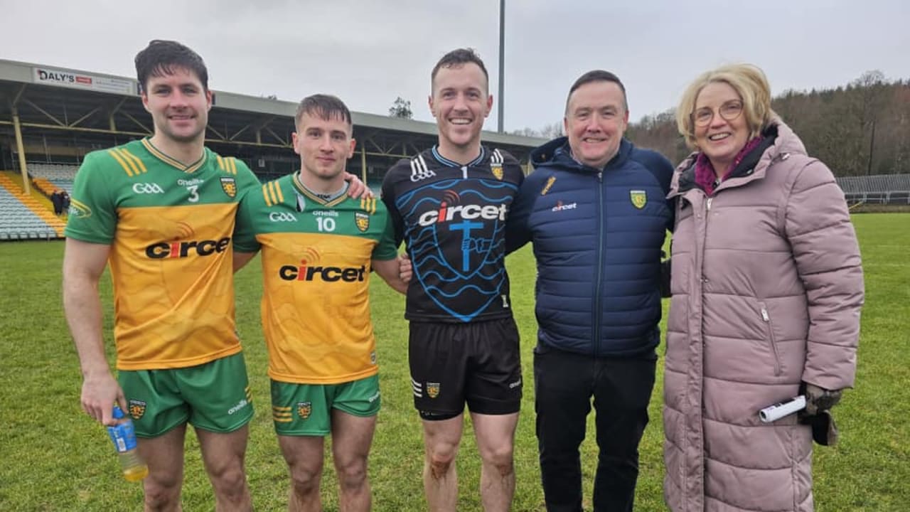 Left to right, St. Naul's and Donegal footballers Brendan McCole, Peadar Mogan, and Gavin Mulreaney pictured with St. Naul's Club Chairperson Cieran Kelly, and Donegal Chairperson and former St. Naul's Club Secretary, Mary Coughlan. 